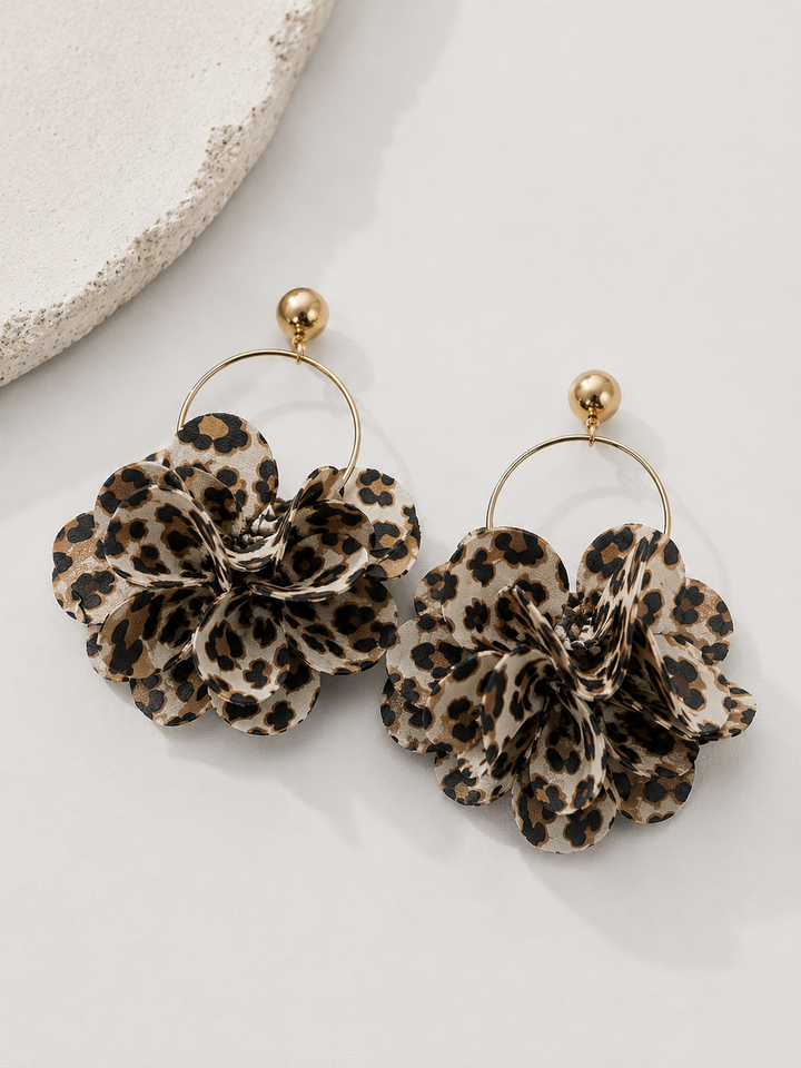 Din σκουλαρίκια animal print